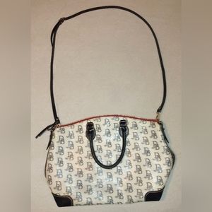 Dooney & Bourke Purse. Black and Off-White with Signature Logo.
